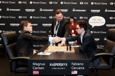 В матче Карлсен - Каруана девятая партия завершилась вничью 